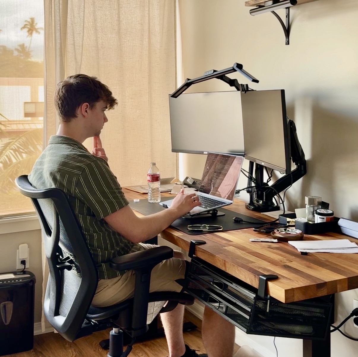 Braden working at his desk